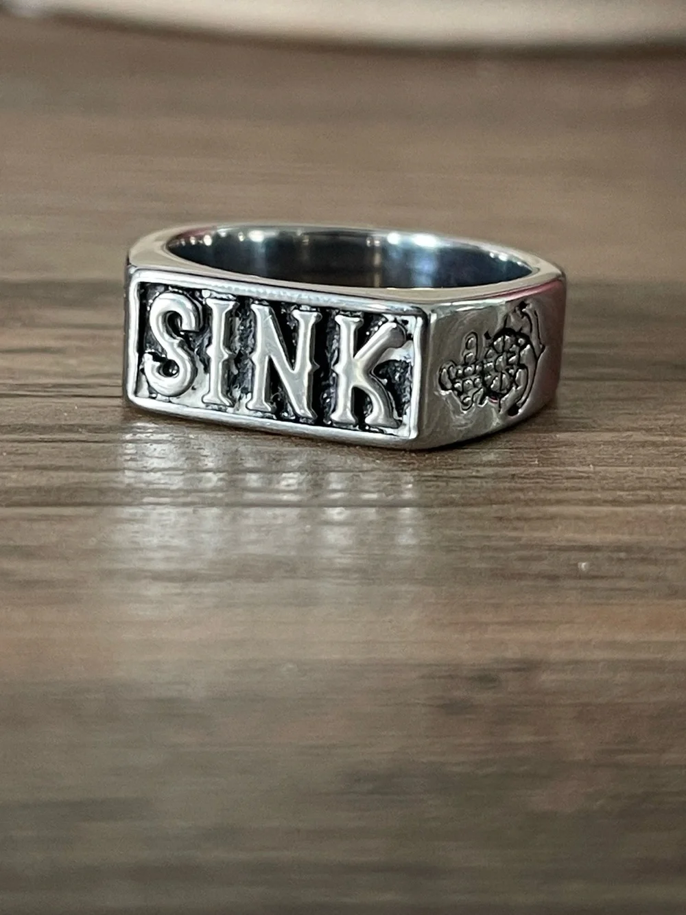 Silver 'SINK' Engraved Ring